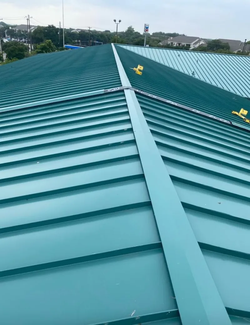 Green commercial metal roof ridge and valley for Metal Roof Repair in Annandale